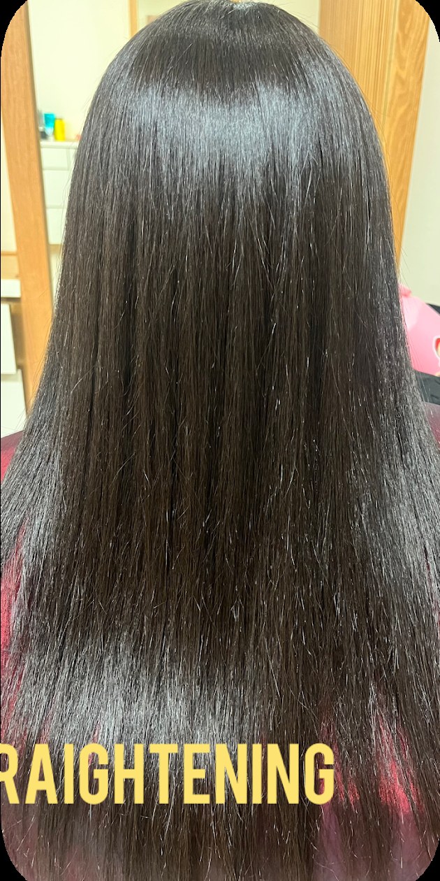 After: tight curls restructured into sleek straight hair at Dass Hair Salon, Carrollton
