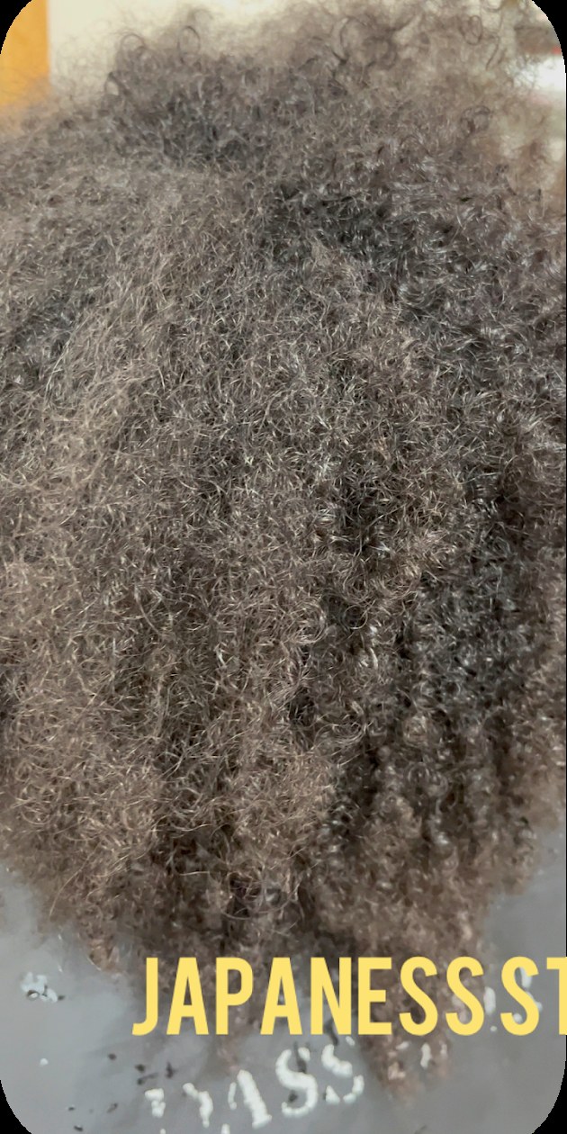 Before: very tight, resistant curls before Japanese permanent straightening at Dass Hair Salon