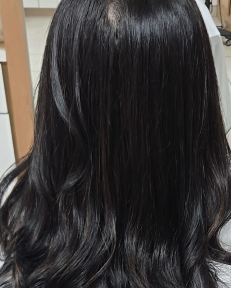 After: glossy digital perm with soft C-curl waves at Dass Hair Salon, Carrollton, Texas