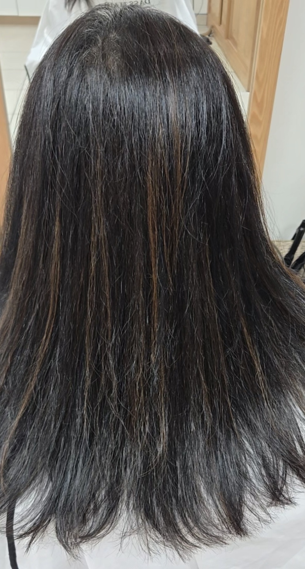Before: dry, frizzy mid-length hair with no shape at Dass Hair Salon, Carrollton